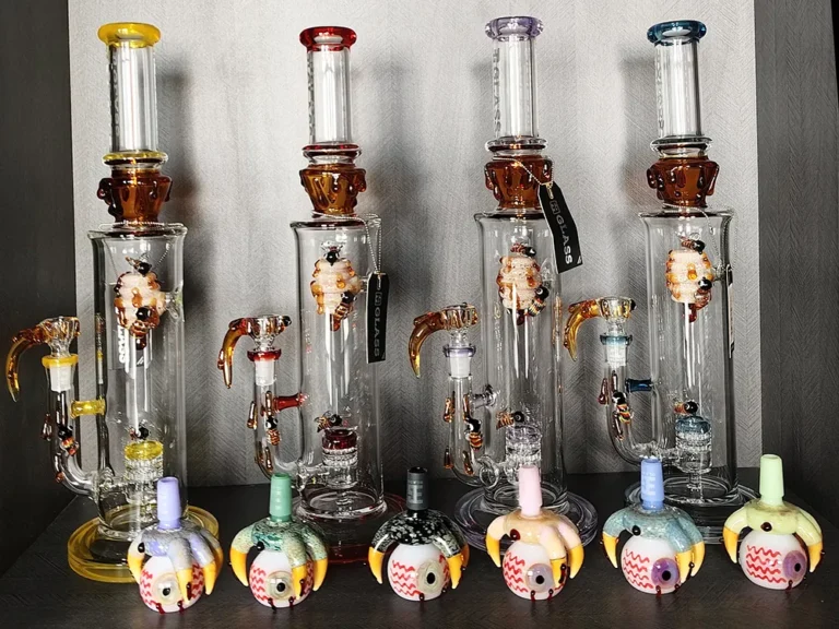 Artist and colored glass bongs wholesale display in a smoke shop