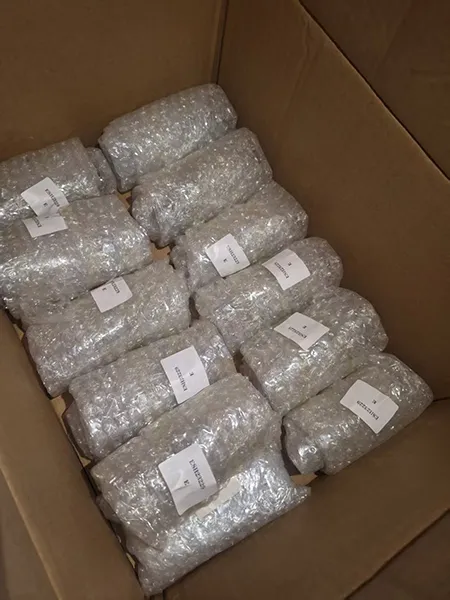 Sample sticker and hang tag applied on EG Glass packaging